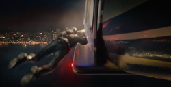 Ant-Man holding on ' helicopter