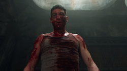 BloodyPunisherStandingOverWRawlins