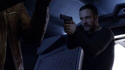 Lance-Hunter-aims-gun-at-Ward