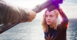 Captain Marvel blocking 's attack