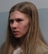 Unnamed actress as Prisoner