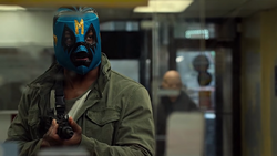 Bobby keeps a close aim at the hostages