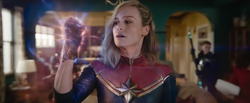Captain Marvel is teleported into a fight