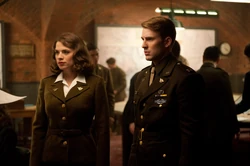 Rogers is debriefed alongside 