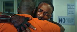 Sam hugs Isaiah