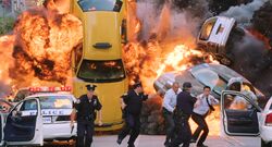 NYPDRunningFromTaxiExplosions