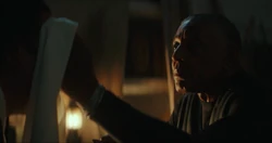 Sidewinder asks a priest about the 