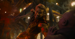 Adam punching Drax