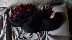 Elektra sleeps inside 's own bed