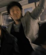 Arthur Lee as Korean Train Passenger