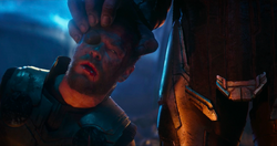 Thor Placed In Thanos' Hand