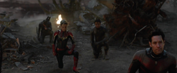 Captain Marvel kneels before 