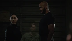 Rodriguez keeps watch over the prisoners