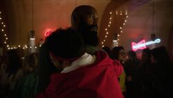 Mackenzie being hugged by 