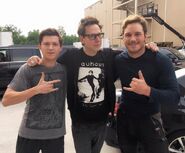 Tom Holland alongside Guardians of the Galaxy Vol. 2's director James Gunn and actor Chris Pratt.