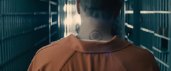 Slattery's tattoo on the back of his neck