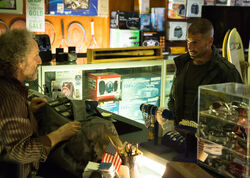 Frank Castle buys police radios and shotgun shells