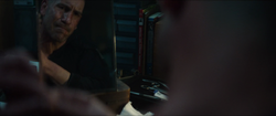 Frank tends to his wound