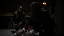 Yo-Yo Rodriguez and Jemma Simmons investigate dead bodies