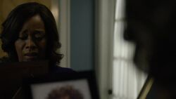 Dillard looks down at 's picture