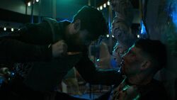 Punisher stabs  in the stomach