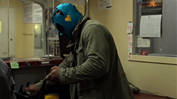 Bobby steals some money from the counters