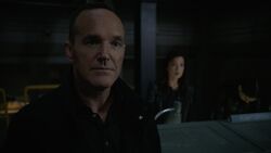 Coulson watches SHIELD's destruction