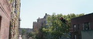 Spider-Man swinging in Queens