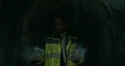 Electro being held in the 