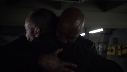 Mack hugs Coulson