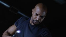 Mackenzie tending to 's wound