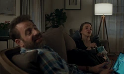 Kaplan asks  to join them to watch a movie