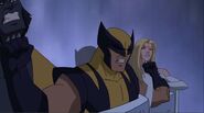 Wolverine about to kill Beast and Emma Frost