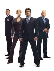 Anthony Stark (Earth-199999), Virginia Potts (Earth-199999), James Rhodes (Earth-199999) and Obadiah Stane (Earth-199999) from Iron Man (film) promo 001