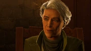 Caretaker at Hunter's bed.