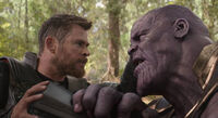 Thor Odinson (Earth-199999) and Thanos (Earth-199999) from Avengers Infinity War 001