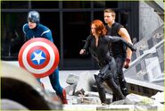 Scarlett Johansson, Chris Evans and Jeremy Renner on set as Black Widow, Captain America and Hawkeye.