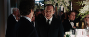 Coulson speaks to Stark at his Firefighter's benefit party