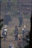 Asgardian warriors and enemies on the set.