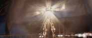 Killian wearing the Mark XLII armor as it self-destructs.
