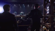 Coulson and Sam Koenig standing in front of the Helicarrer.