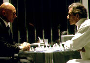 Playing chess with his old friend Charles Xavier.