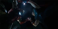 Thor and Iron Man battle.