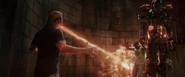Aldrich Killian breathing fire at James Rhodes.