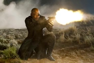 Nick Fury shooting.jpg (106 KB) Nick Fury firing a gun.