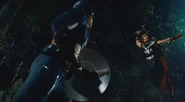 Thor and Captain America fight.