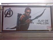 A promotional billboard featuring Hawkeye.