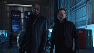 Clint Barton with director Nick Fury.