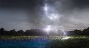 Thor summoning lightning.