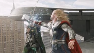 Thor and Loki fighting.